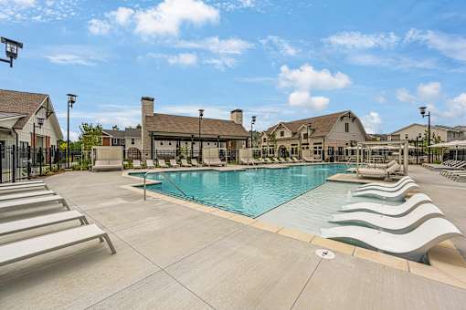 the swimming pool at the estates apartments