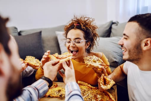 Square One eating pizza