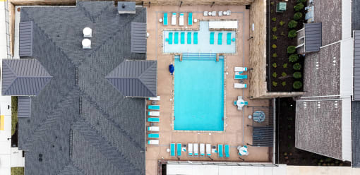 Aerial view showing amenities like landscaped courtyard & large swimming pool in West Knoxville, TN.