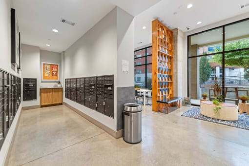the entrance to the building has a large wall of wine racks