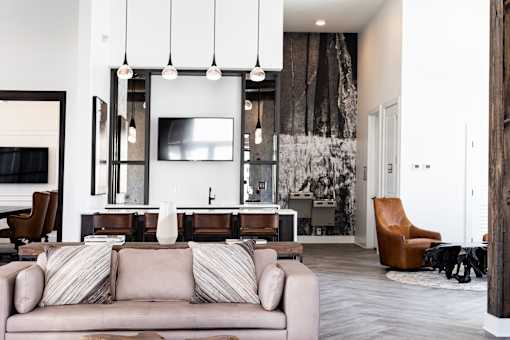 a living room with a couch and a tv