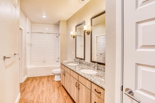 Bathroom with Designer Granite Countertops at The Parker at Maitland Station in Maitland, FL