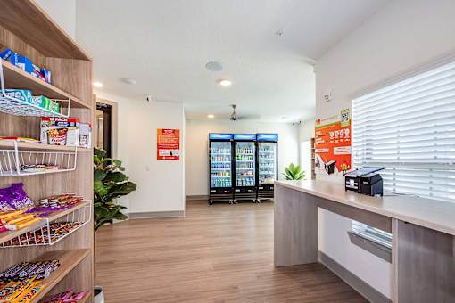 A store interior with a variety of snacks on the shelves.