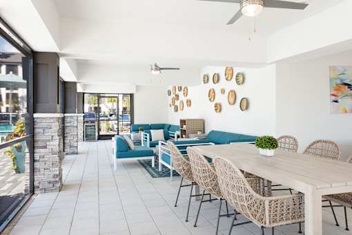 A patio with a table and chairs is shown.
