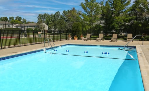 our apartments showcase a swimming pool  at Pheasant Run, Saginaw, MI, 48638