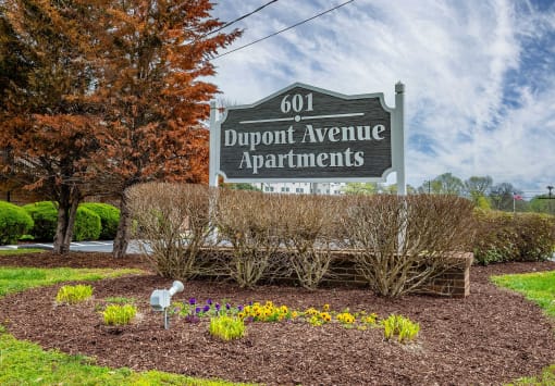 a sign for the dupont avenue apartments