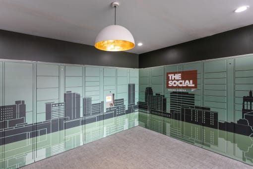 a mural of a city skyline is painted on the wall of a room