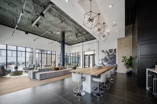 a view of the living room and dining area from the kitchen at Altis Grand Central, Tampa, 33606