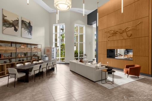 a rendering of a living room and dining room with a table and chairs