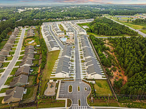 an aerial view of a parking lot in a city