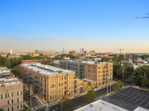 an aerial view of apartment buildings in a city