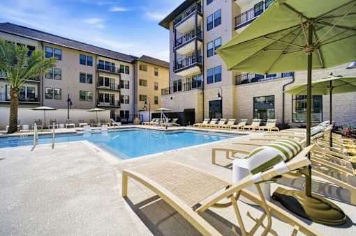 Panama City Beach, FL, Apartments on 30A - Vintage Lake Powell - Heated swimming pool area with sun loungers