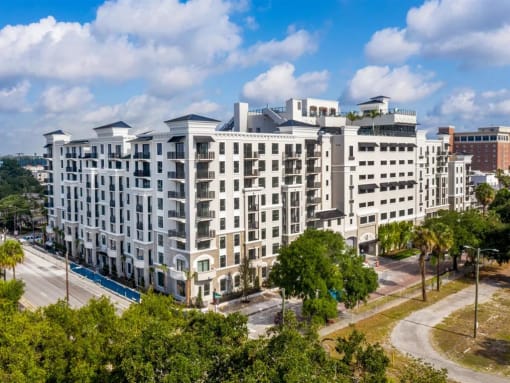 a large white building with trees in front of it at Altis Grand Central, Tampa, 33606