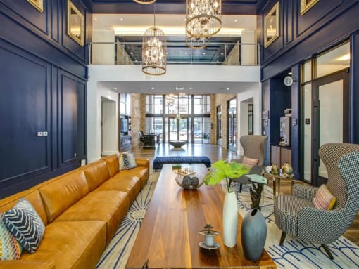 a living room filled with furniture and a large window at Altis Grand Central, Florida