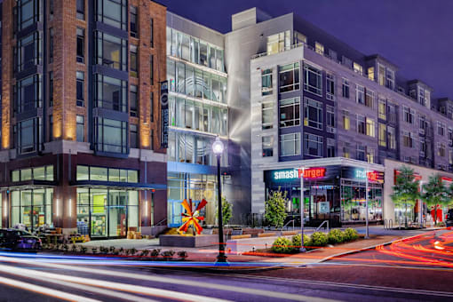 A Smashburger restaurant is lit up at night.