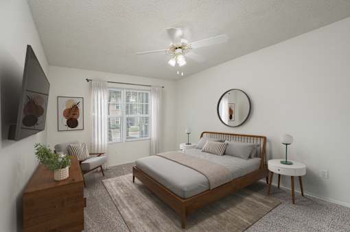 A bedroom with a bed, nightstand, and a plant on a table.