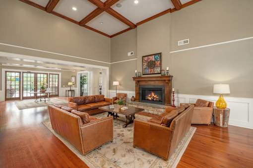 A living room with a fireplace and a couch.