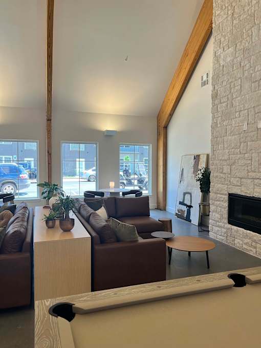 a living room with a couch and a table