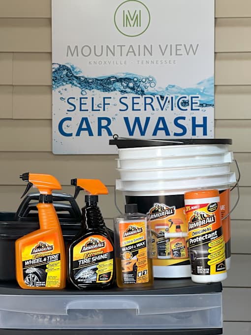 A self service car wash station with products from Mountain View.