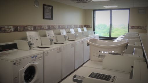 a row of washing machines in a public laundromat