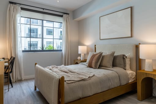 a bedroom with a bed and a window at Leena Plantation, Florida, 33322