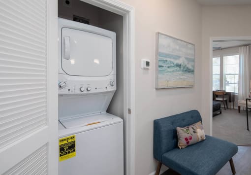 a washer and dryer are available in the living room