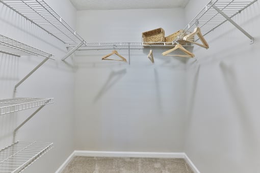 a walk in closet in a 555 waverly unit at Crestmont at Thornblade, Greenville, SC, 29615