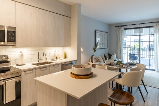 a kitchen and living room in a 555 waverly unit at Leena Plantation, Florida