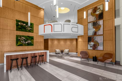 a rendering of a lobby with a bar and stools