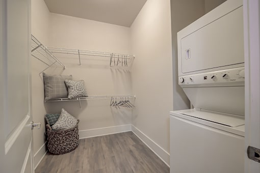 A laundry room with a washer and dryer.