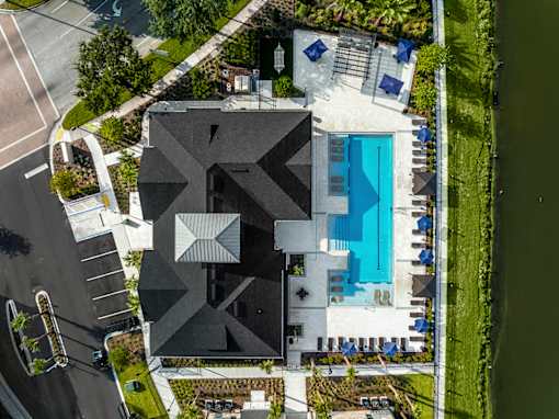 A modern house with a pool and a swimming pool.