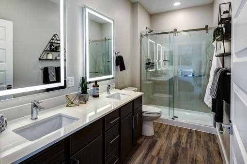 Bathroom with vanity at Icon Apartment Homes at Ferguson Farm, Bozeman