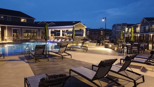 Night view of pool at Icon Apartment Homes at Ferguson Farm, Bozeman