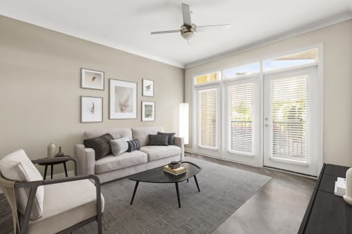 a living room with a couch and a table