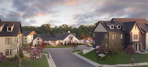 A residential area with houses and a road.