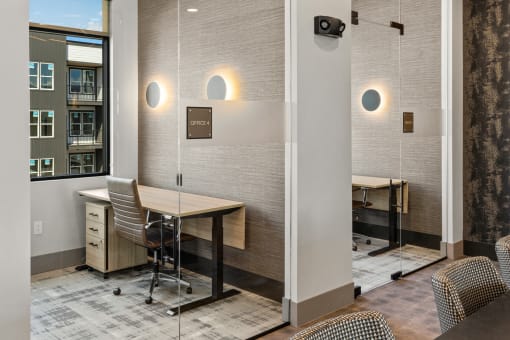 a conference room with a table and chairs and a window
