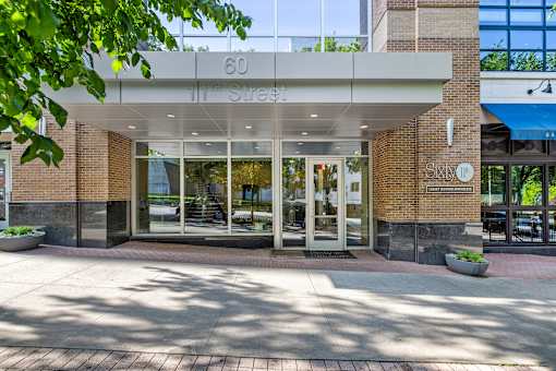 The front of a building with the number 60 on it.