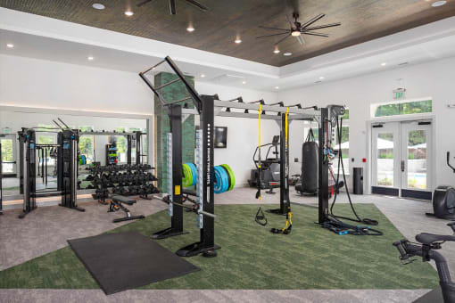 the home has a gym with weights and cardio equipment
