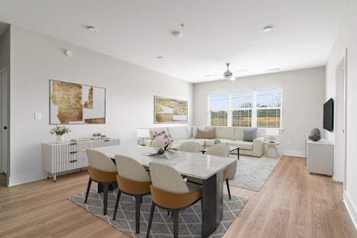 A modern dining room with a table set for four.