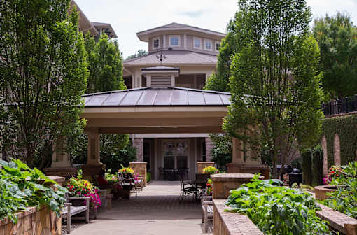 A house with a patio and a garden.