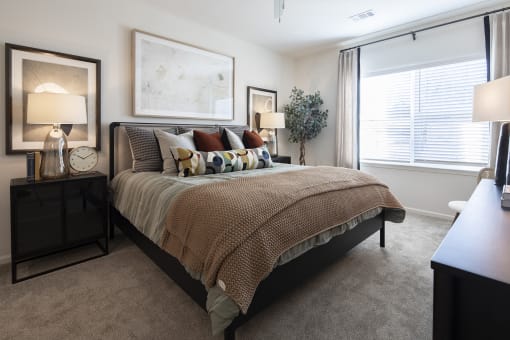 the preserve at ballantyne commons apartments bedroom with large bed