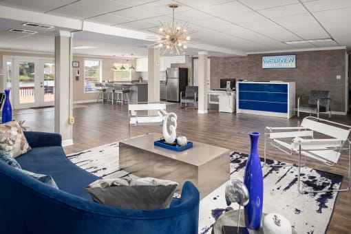 a living room filled with furniture and a large chandelier at Waterview at Rocky Point, Tampa, 33634