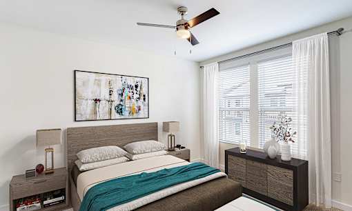 A bedroom with a bed, nightstand, and a painting on the wall.