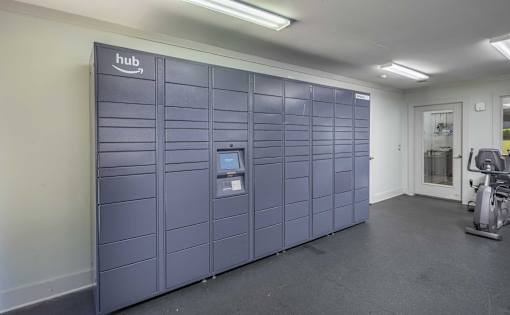 A storage room with a row of lockers and a sign that says "hub".