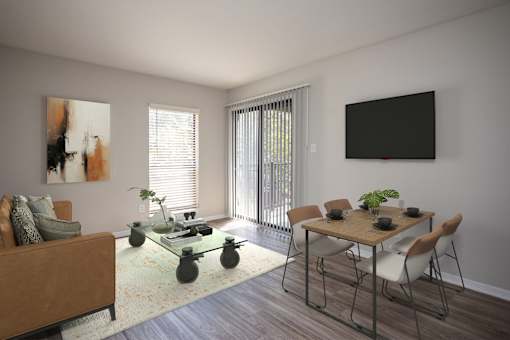 A living room with a brown couch, a glass coffee table, a dining table with chairs, and a painting on the wall.