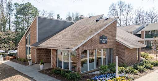 A brick building with a sign that says "MOONLAND".