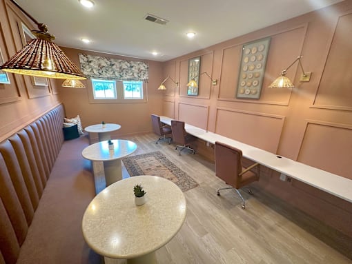 A room with brown walls and a white table in the middle.