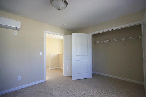 Second Rye bedroom with carpeted floors