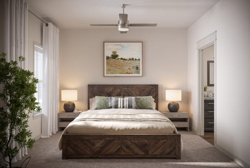 a bedroom with a bed and a ceiling fan