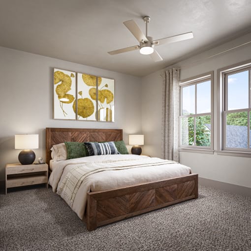 a bedroom with a bed and a ceiling fan